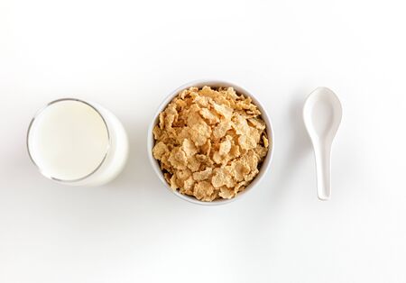 Healthy Corn Flakes with milk for Breakfast on tableの写真素材