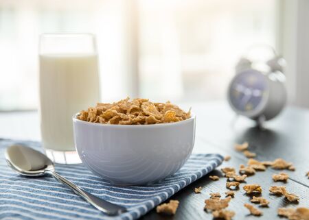 Healthy Corn Flakes with milk for Breakfast on tableの写真素材
