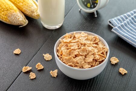 Healthy Corn Flakes with milk for Breakfast on tableの写真素材