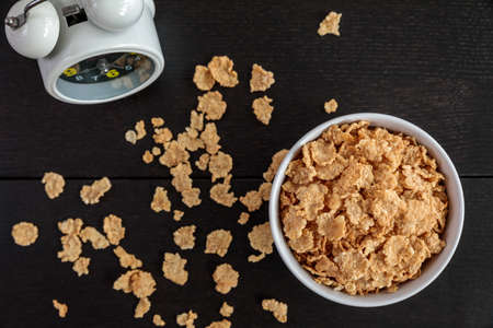 Healthy Corn Flakes with milk for Breakfast on tableの写真素材