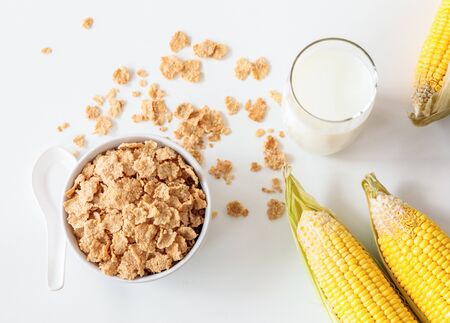 Healthy Corn Flakes with milk for Breakfast on tableの写真素材