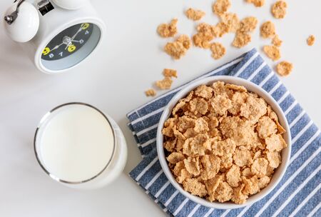 Healthy Corn Flakes with milk for Breakfast on tableの写真素材