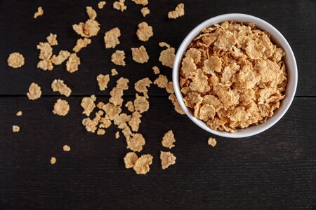 Healthy Corn Flakes with milk for Breakfast on tableの写真素材