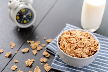 Healthy Corn Flakes with milk for Breakfast on tableの写真素材