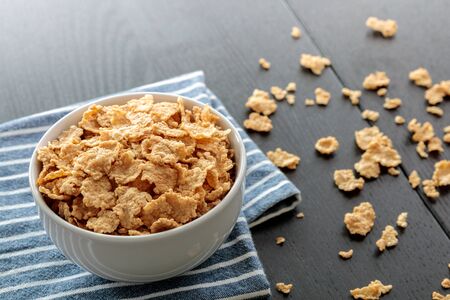 Healthy Corn Flakes with milk for Breakfast on tableの写真素材