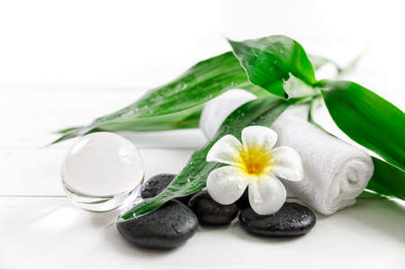 spa concept with candle, stone, flower and bamboo, relaxationの写真素材