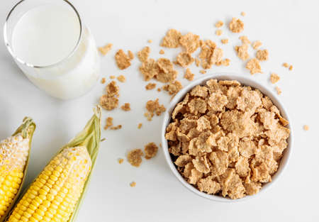 Healthy Corn Flakes with milk for Breakfast on table, food and drinkの写真素材