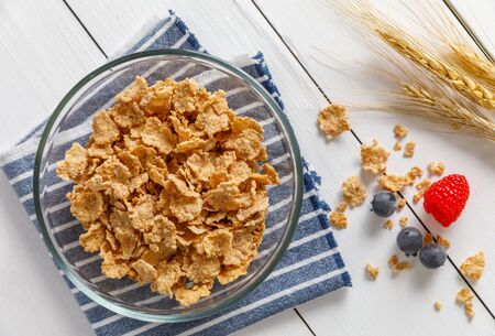 Healthy Corn Flakes with milk for Breakfast on table, food and drinkの写真素材