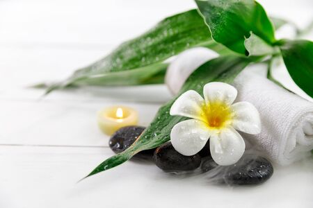 spa concept with candle, stone, flower and bamboo, relaxationの写真素材