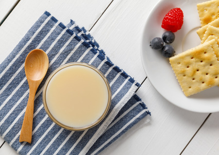 crackers with condensed milk and fruit, breakfast
