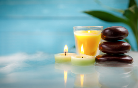 spa concept with candle, stone, flower and bamboo, relaxationの写真素材