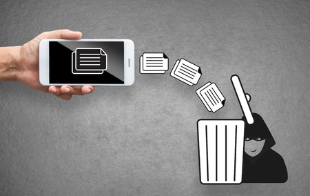 data online information with robber and trashの写真素材