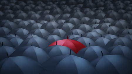 Businessman with red umbrella among others, unique different conceptの写真素材