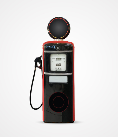 Old vintage gasoline petrol pump isolated on plainの写真素材