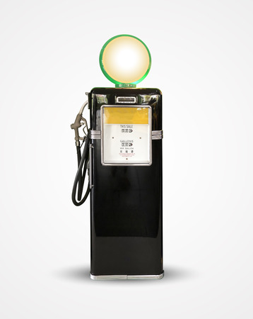 Old vintage gasoline petrol pump isolated on plainの写真素材