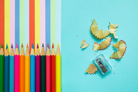 Colored pencils, trash and rainbow colorful stripes, stationaryの写真素材