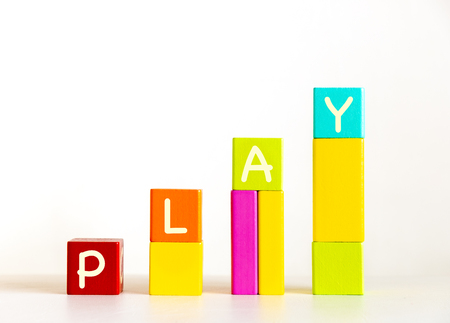 Colorful wooden blocks toys with word play, childhoodの写真素材