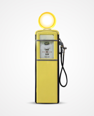 Old vintage gasoline petrol pump isolated on plainの写真素材
