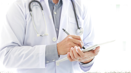 doctor examine with stethoscope, health care hospitalの写真素材