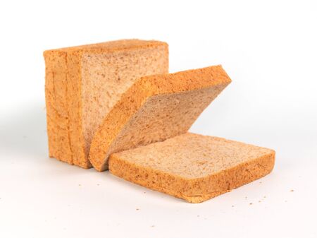 Loaf of sliced whole wheat bread, healthy organic breakfast food
