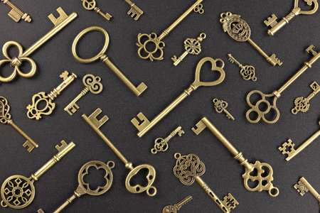 isolated vintage old golden and bronze keyの写真素材