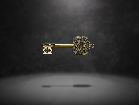 isolated vintage old golden and bronze key, successful conceptの写真素材