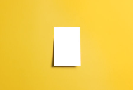 blank adhesive sticky note memory notepad on a boardの写真素材