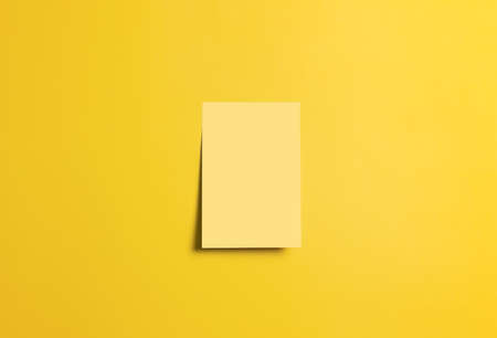 blank adhesive sticky note memory notepad on a boardの写真素材