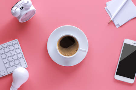 a cup of coffee on work space office, businessの写真素材
