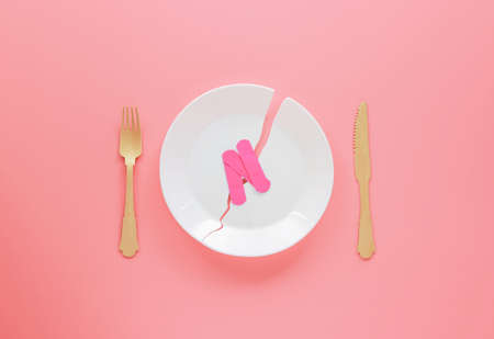 fix the broken ceramic dish with adhesive bandageの写真素材