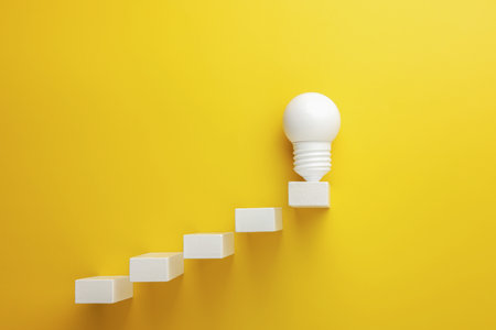 wooden cubes with light bulb, rising business growth graph chartの写真素材