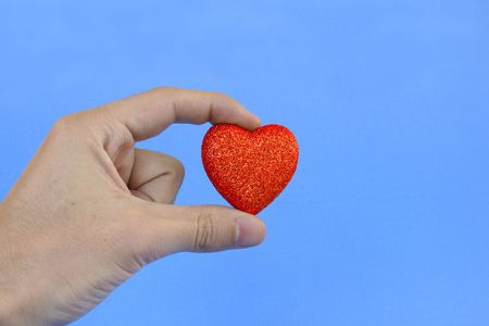 holding a heartの写真素材