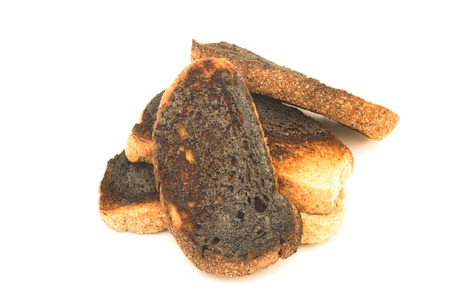 burnt toast over whiteの写真素材