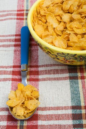 cereal bowl  and spoon on table 