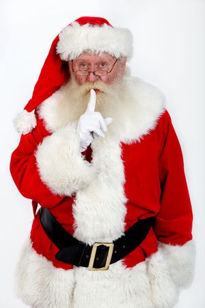 father christmas   gesturing shush studio shot on off whiteの写真素材
