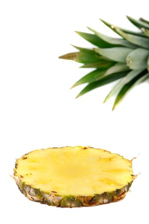 pineapple slice and leaves isolated on whiteの写真素材