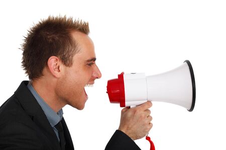 young businessman making an announcement with a megaphoneの写真素材