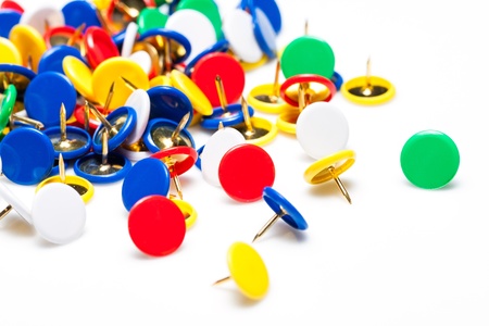 Colorful push pins on white background close up の写真素材
