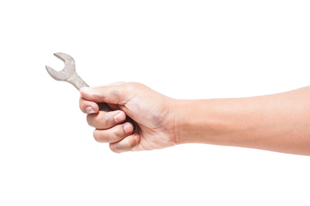 hand holding a spanner isolated on a white backgroundの写真素材