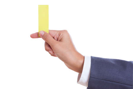 Businessman hand holding sticky note, isolated on white  