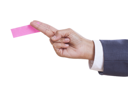 Businessman hand holding sticky note  with using path の写真素材
