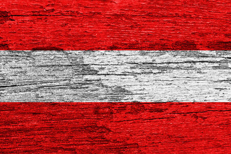 Austria Flag painted on old wood plank background の写真素材