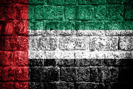 United Arab Emirates flag on texture brick wall の写真素材