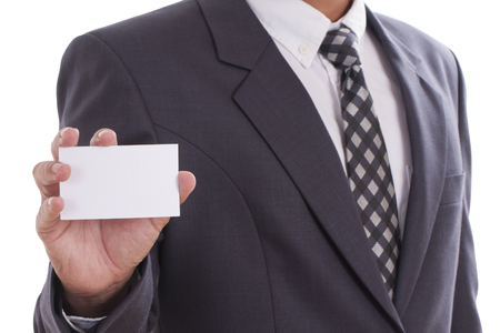Businessman showing and handing a blank business card, isolated on white background  with using pathの写真素材