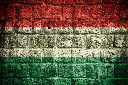 Hungary flag painted on old brick wall の写真素材