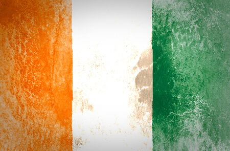 Grungy Flag of Ivory coast on vintage paper の写真素材