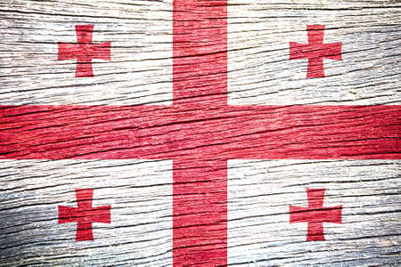 Georgia Flag on old wood texture の写真素材