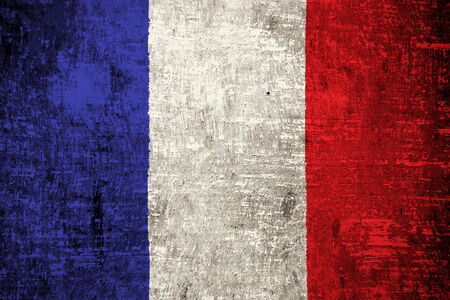 French flag painted on old wood backgroundの写真素材