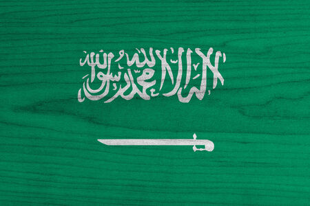 saudi arabia flag on wood background の写真素材