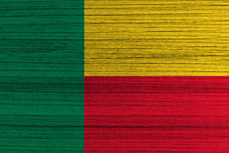 Benin Flag on wood background の写真素材